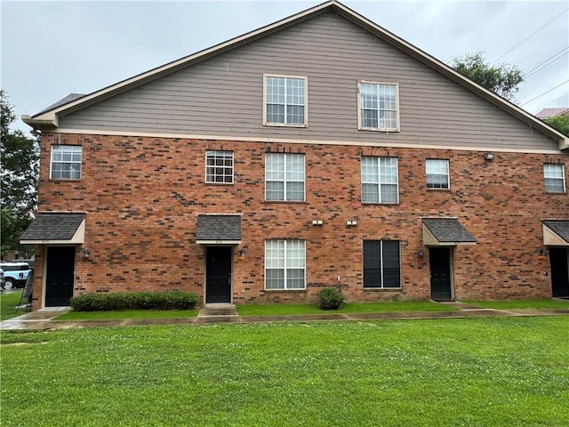 710 E Boyd Dr Unit 906, Baton Rouge, LA 70808 - view of front of home featuring a front yard and brick siding