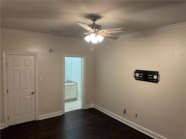 710 E Boyd Dr Unit 906, Baton Rouge, LA 70808 - spare room with a ceiling fan, ornamental molding, dark wood-type flooring, and baseboards