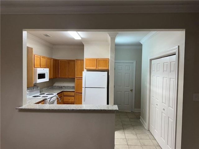 710 E Boyd Dr Unit 906, Baton Rouge, LA 70808 - kitchen with white appliances, a peninsula, light tile patterned flooring, brown cabinetry, and light stone countertops