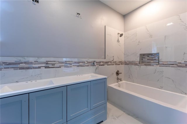 324 Salem Dr, Mandeville, LA 70471 - full bathroom featuring  shower combination, tile walls, marble finish floors, and a sink