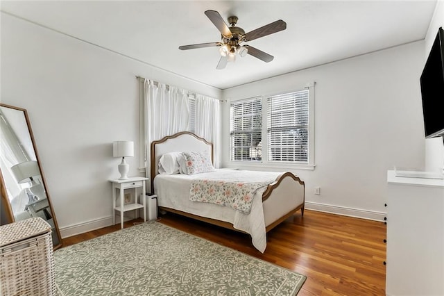 6817 Catina St, New Orleans, LA 70124 - bedroom with baseboards, wood finished floors, and a ceiling fan