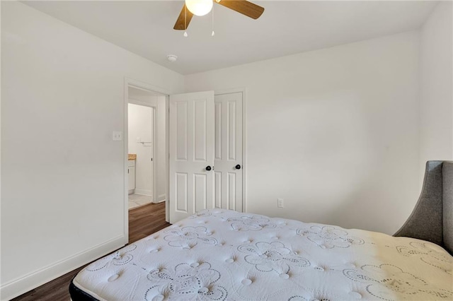 172 Winnona Dr, Westwego, LA 70094 - bedroom featuring dark wood-style flooring, baseboards, and ceiling fan
