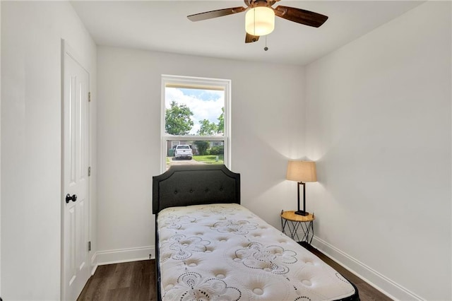 172 Winnona Dr, Westwego, LA 70094 - bedroom with baseboards, dark wood-style floors, and ceiling fan