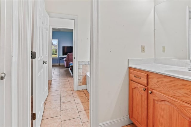 52125 Oak Ridge Dr, Franklinton, LA 70438 - bathroom featuring tile patterned flooring, vanity, and baseboards