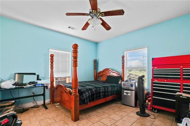 52125 Oak Ridge Dr, Franklinton, LA 70438 - tiled bedroom featuring ceiling fan