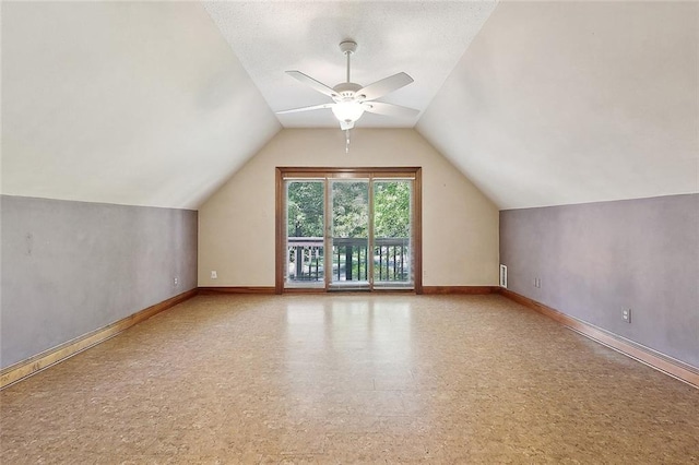 201 Natchez Pl, Mandeville, LA 70471 - additional living space with baseboards, ceiling fan, and vaulted ceiling