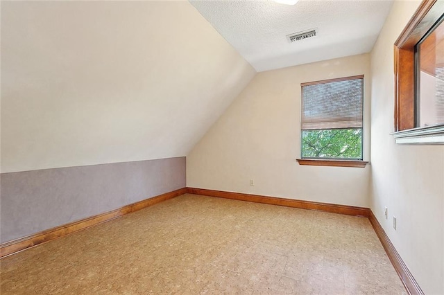 201 Natchez Pl, Mandeville, LA 70471 - bonus room with lofted ceiling and baseboards
