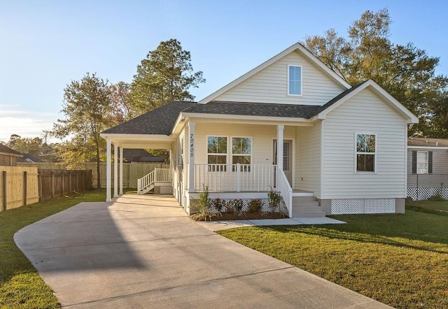 70405 9th St, Covington, LA 70433 - view of front of house featuring a porch, concrete driveway, and a shingled roof