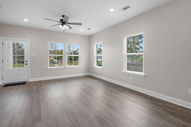 70405 9th St, Covington, LA 70433 - unfurnished room with a ceiling fan, baseboards, dark wood-style floors, and recessed lighting