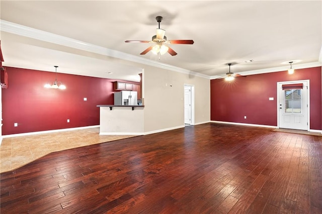 28475 Apple Blossom Ln, Ponchatoula, LA 70454 - unfurnished living room with ceiling fan, hardwood / wood-style floors, ornamental molding, baseboards, and a chandelier
