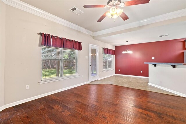 28475 Apple Blossom Ln, Ponchatoula, LA 70454 - unfurnished living room with crown molding, hardwood / wood-style flooring, baseboards, and a ceiling fan
