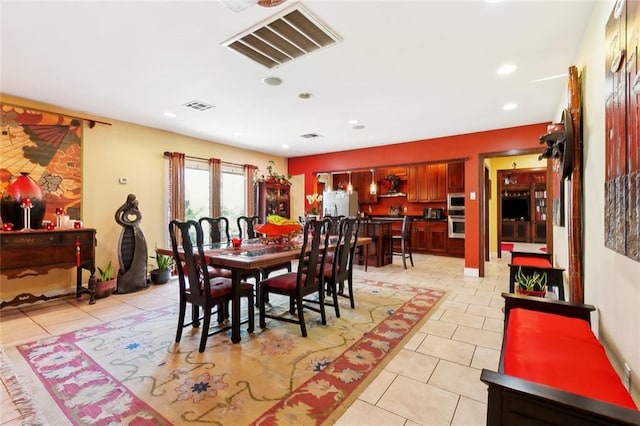 402 28th St, New Orleans, LA 70124 - dining room featuring light tile patterned floors and recessed lighting