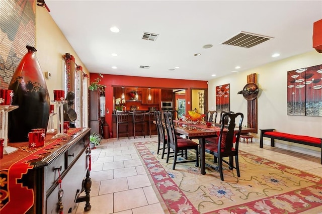 402 28th St, New Orleans, LA 70124 - dining space featuring light tile patterned floors and recessed lighting
