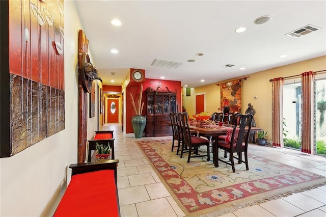 402 28th St, New Orleans, LA 70124 - dining room with light tile patterned floors and recessed lighting