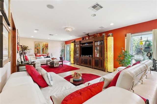 402 28th St, New Orleans, LA 70124 - living area with tile patterned floors and recessed lighting