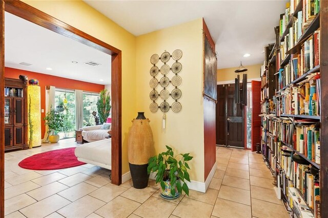 402 28th St, New Orleans, LA 70124 - corridor with light tile patterned flooring and baseboards