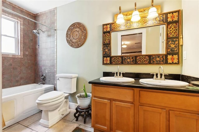 402 28th St, New Orleans, LA 70124 - bathroom featuring double vanity, toilet, bathing tub / shower combination, and tile patterned floors