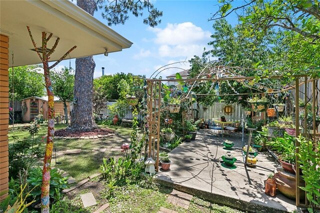 402 28th St, New Orleans, LA 70124 - fenced backyard with a patio area