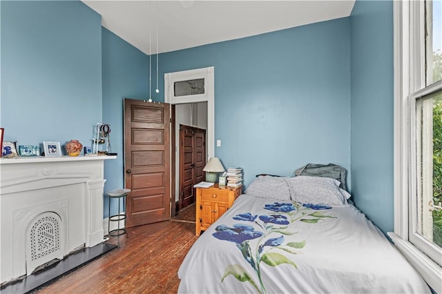 230406 Valmont St, New Orleans, LA 70115 - bedroom featuring dark wood-style flooring