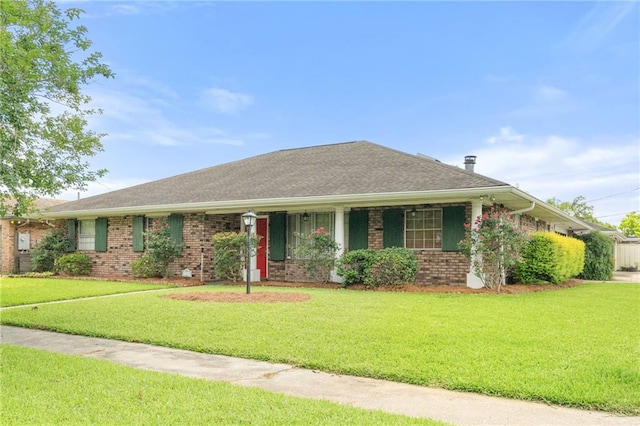 2200 Kathleen Dr, Marrero, LA 70072 - ranch-style house featuring brick siding and a front lawn