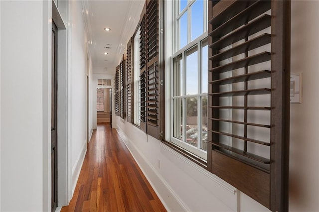 2026 Camp St, New Orleans, LA 70130 - hallway featuring baseboards, healthy amount of natural light, wood finished floors, and recessed lighting