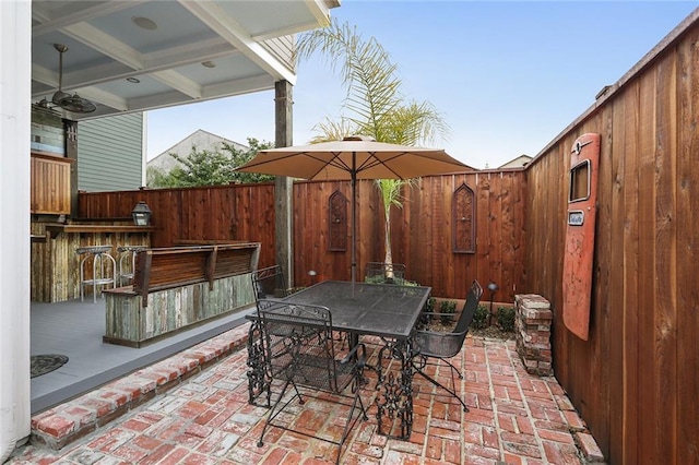 2026 Camp St, New Orleans, LA 70130 - view of patio featuring fence