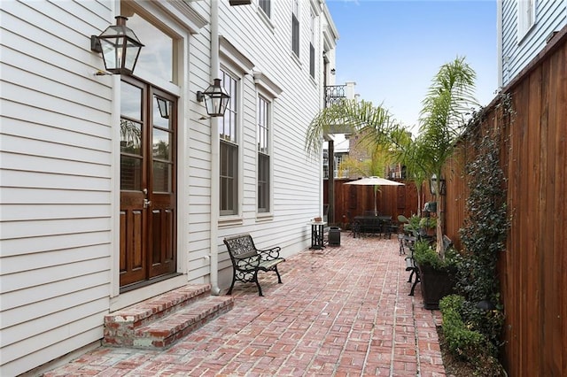 2026 Camp St, New Orleans, LA 70130 - view of patio with a fenced backyard and entry steps
