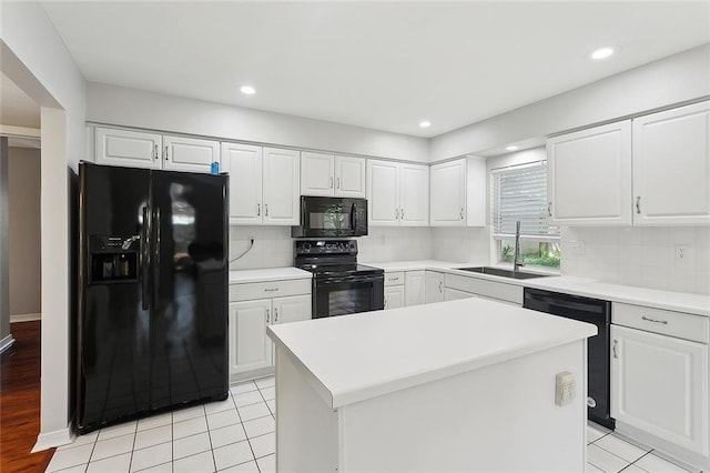 3604 Meadow Lake Dr W, Slidell, LA 70461 - kitchen featuring black appliances, a sink, tasteful backsplash, white cabinetry, and recessed lighting
