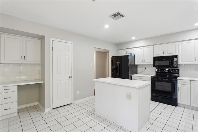 3604 Meadow Lake Dr W, Slidell, LA 70461 - kitchen with black appliances, tasteful backsplash, light countertops, white cabinets, and recessed lighting