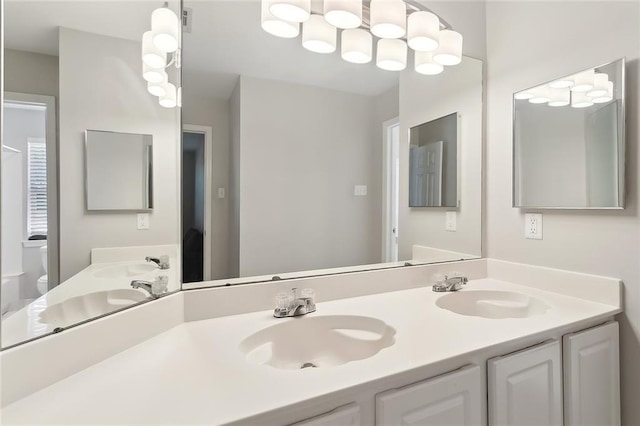 3604 Meadow Lake Dr W, Slidell, LA 70461 - bathroom featuring double vanity and toilet