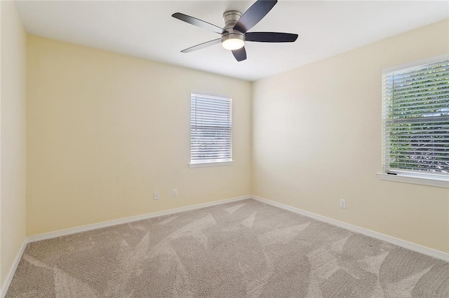 3604 Meadow Lake Dr W, Slidell, LA 70461 - unfurnished room featuring ceiling fan, plenty of natural light, carpet floors, and baseboards