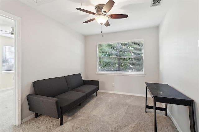 3604 Meadow Lake Dr W, Slidell, LA 70461 - living area with ceiling fan, carpet, and baseboards