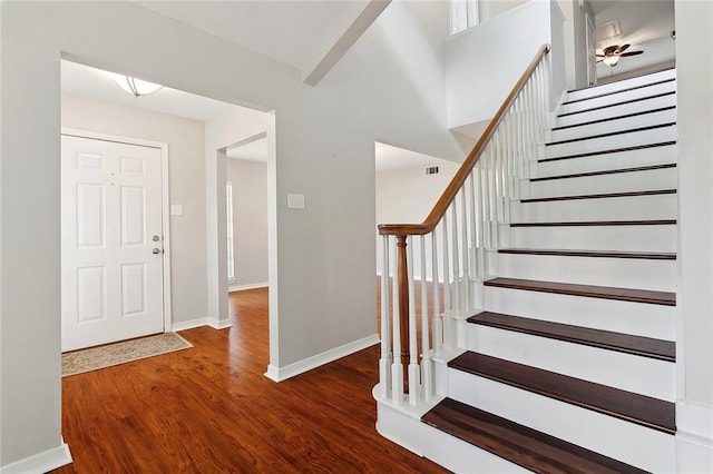 3604 Meadow Lake Dr W, Slidell, LA 70461 - foyer featuring wood finished floors, stairway, baseboards, and ceiling fan