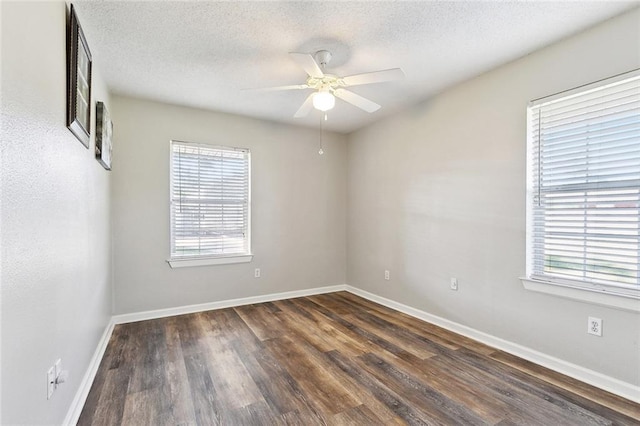 511 Gassen St, Luling, LA 70070 - empty room with healthy amount of natural light, ceiling fan, wood finished floors, baseboards, and a textured ceiling