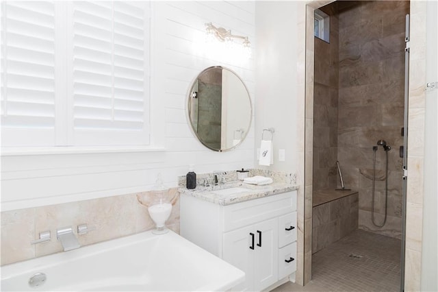 201 Jardin Loop, Covington, LA 70433 - full bathroom with vanity, a bath, and a tile shower
