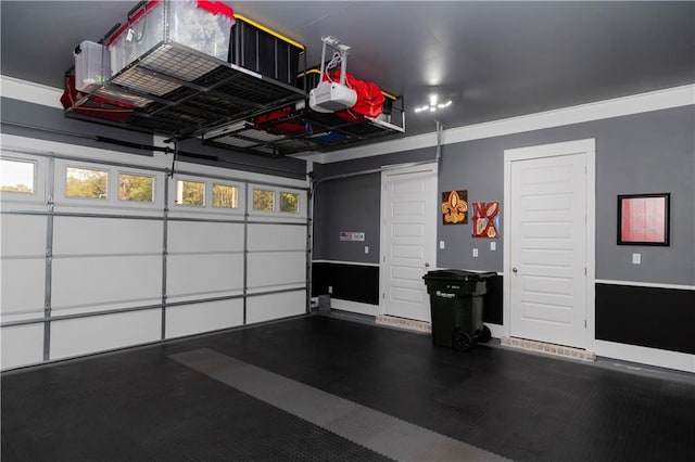 201 Jardin Loop, Covington, LA 70433 - garage featuring a garage door opener