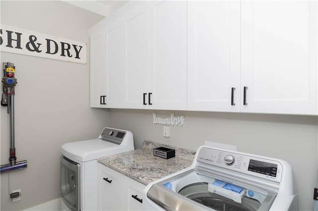 201 Jardin Loop, Covington, LA 70433 - clothes washing area featuring cabinet space and washer and clothes dryer