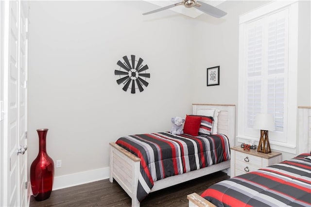 201 Jardin Loop, Covington, LA 70433 - bedroom featuring dark wood-style flooring, baseboards, and a ceiling fan