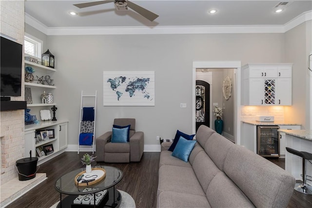 201 Jardin Loop, Covington, LA 70433 - living area featuring wine cooler, ornamental molding, a ceiling fan, dark wood-type flooring, and baseboards