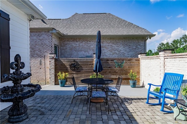 201 Jardin Loop, Covington, LA 70433 - view of patio / terrace featuring fence and outdoor dining area