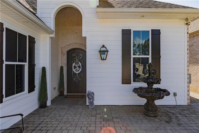 201 Jardin Loop, Covington, LA 70433 - doorway to property with a shingled roof