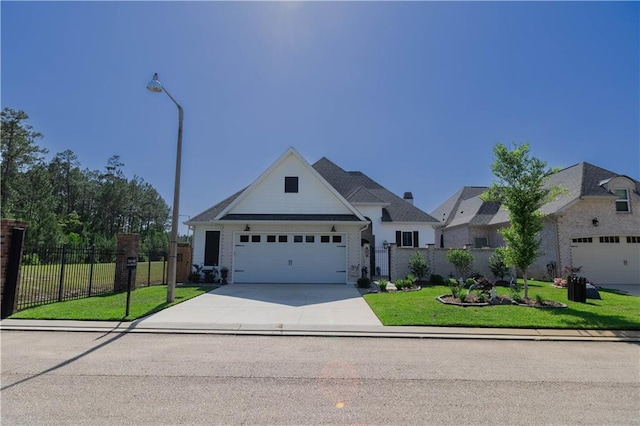 201 Jardin Loop, Covington, LA 70433 - view of front of house featuring driveway and a garage