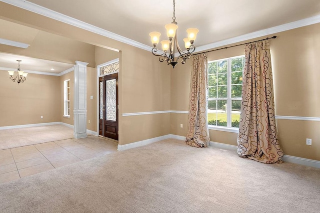 1134 Belair Blvd, Slidell, LA 70460 - carpeted spare room with a chandelier, crown molding, baseboards, ornate columns, and tile patterned flooring