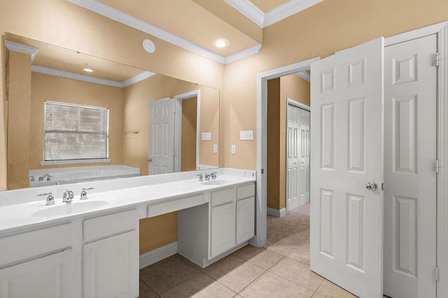 1134 Belair Blvd, Slidell, LA 70460 - full bath with tile patterned flooring, ornamental molding, a garden tub, double vanity, and baseboards