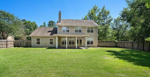 1134 Belair Blvd, Slidell, LA 70460 - rear view of property featuring a chimney and a patio area
