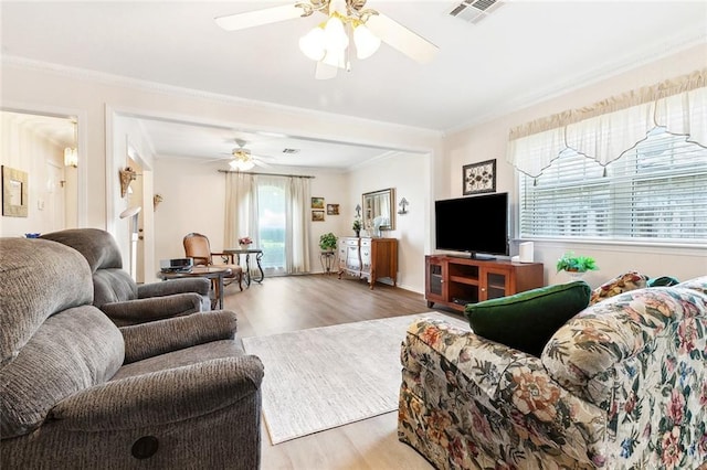 3117 Texas Ave, Kenner, LA 70065 - living area with a ceiling fan, wood finished floors, and ornamental molding