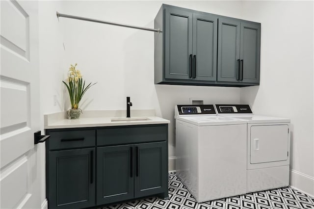 3804 Prytania St, New Orleans, LA 70115 - laundry room featuring cabinet space and washing machine and dryer
