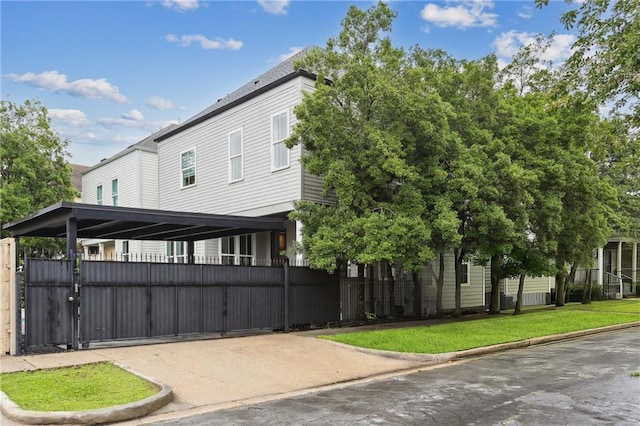 3804 Prytania St, New Orleans, LA 70115 - view of side of property with a gate