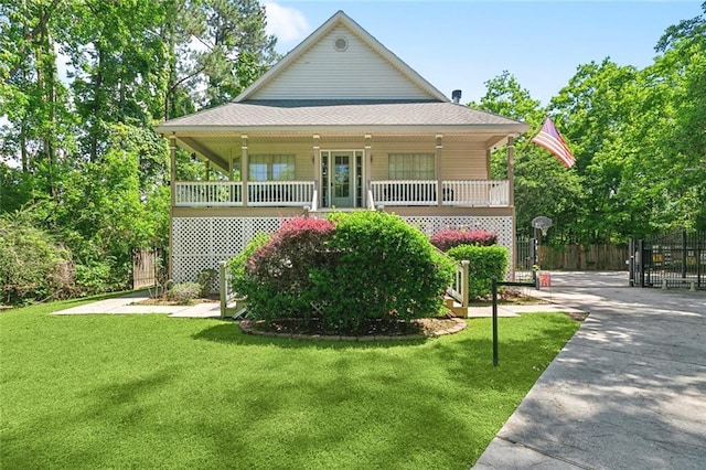 5 Rhonda Ct, Covington, LA 70433 - view of front facade with a porch and a gate
