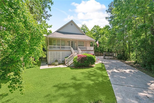 5 Rhonda Ct, Covington, LA 70433 - view of front of home with covered porch, stairway, a front yard, and concrete driveway